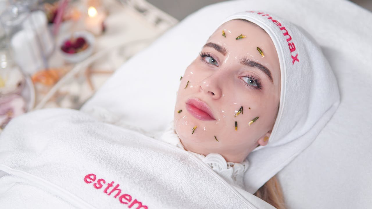 Woman enjoying a relaxing Herbal skincare treatment, promoting health and beauty.